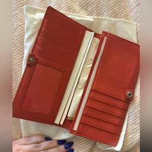 Great condition MCM wallet with all tags and paper work.